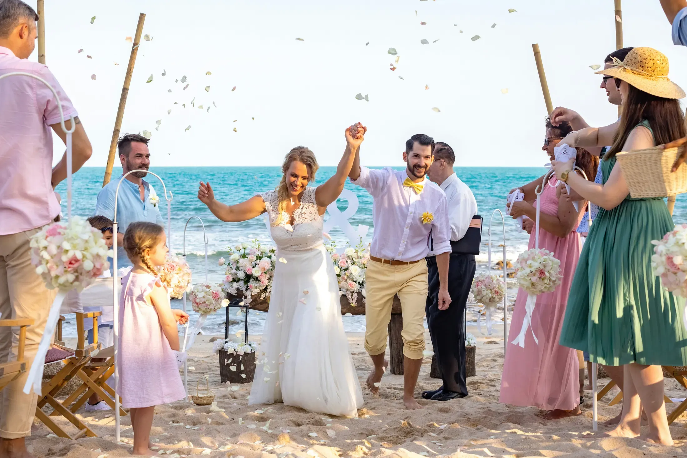 Destination wedding ceremony setup in a tropical setting
