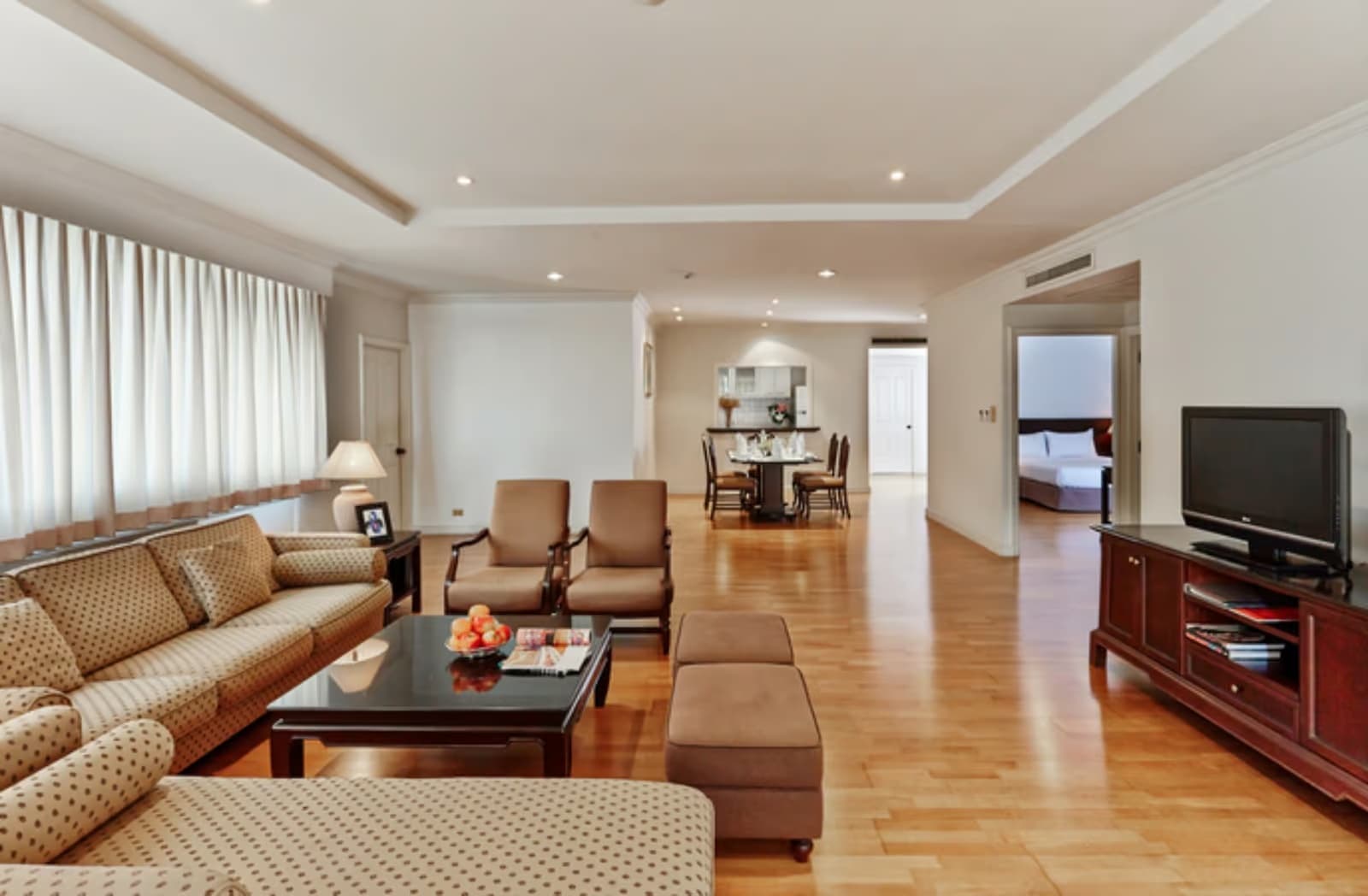 Spacious open-plan living and dining area in 2 bedroom at Riverine Place